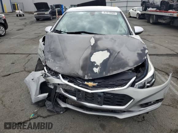2017 Chevrolet Cruze LS z VIN 1G1BC5SM8H7124364, wystawiony jako Copart lot #81910565 z przebiegiem 75 631 mil mil oraz Szkoda całkowita • Salvage title. Historia ofert i sprzedaży dostępna na DreamBid. Obrazek 5.