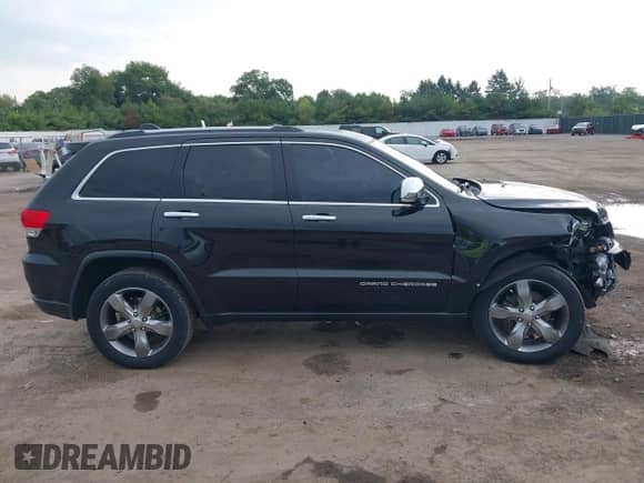 2014 Jeep Grand Cherokee Limited z VIN 1C4RJFBG6EC589188, wystawiony jako IAAI lot #43290881 z przebiegiem 148 318 mil mil oraz . Historia ofert i sprzedaży dostępna na DreamBid. Obrazek 13.