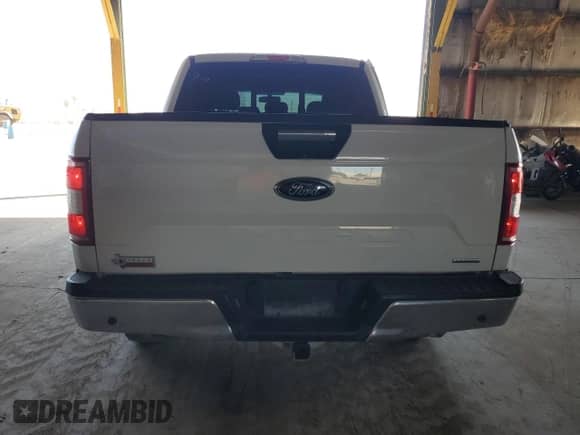 2018 Ford F-150 XLT z VIN 1FTEW1EGXJKE75905, wystawiony jako Copart lot #89911635 z przebiegiem Nie podano mil oraz Szkoda całkowita • Salvage title. Historia ofert i sprzedaży dostępna na DreamBid. Obrazek 6.