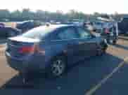 2014 Chevrolet Cruze 1LT z VIN 1G1PC5SB7E7144699, wystawiony jako IAAI lot #43241551 z przebiegiem 156 411 mil mil oraz . Historia ofert i sprzedaży dostępna na DreamBid. Obrazek 4.