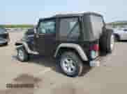 2003 Jeep Wrangler X z VIN 1J4FA39S23P359983, wystawiony jako Copart lot #59469005 z przebiegiem 118 585 mil mil oraz Czysty tytuł • Clean title. Historia ofert i sprzedaży dostępna na DreamBid. Obrazek 2.
