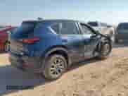 2023 Mazda CX-5 S Select with VIN JM3KFBBM0P0285688, listed as a Copart auction lot 67590615 with 28,029 mi miles and Salvage title. Bid and sale history available at DreamBid. Image 3.