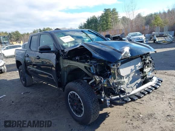 2024 Toyota Tacoma SR5 with VIN 3TMLB5JN0RM008463, listed as a IAAI auction lot 40979020 with 4,710 mi miles and . Bid and sale history available at DreamBid. Image 1.