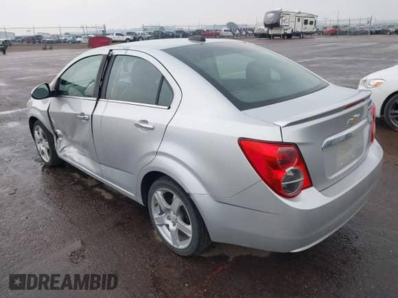 2015 Chevrolet Sonic LTZ with VIN 1G1JE5SB2F4123973, listed as a IAAI auction lot 42428071 with 137,672 mi miles and . Bid and sale history available at DreamBid. Image 3.
