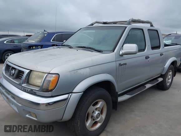 2000 Nissan Frontier XE with VIN 1N6ED27T2YC425703, listed as a IAAI auction lot 42687301 with 186,317 mi miles and . Bid and sale history available at DreamBid. Image 2.
