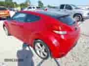 2013 Hyundai Veloster w/Gray Int z VIN KMHTC6AD7DU157057, wystawiony jako IAAI lot #43192334 z przebiegiem 120 938 mil mil oraz . Historia ofert i sprzedaży dostępna na DreamBid. Obrazek 3.