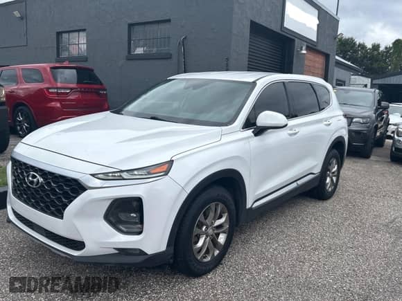 2019 Hyundai Santa Fe SEL с VIN 5NMS33AD0KH053559, выставлен на аукционе Copart как лот 84977185 с пробегом 129 077 миль миль и Чистый • Clean title. История ставок и продаж доступна на DreamBid. Изображение 2.