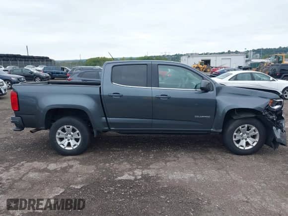 2015 Chevrolet Colorado 2WD LT z VIN 1GCGSBEA2F1217266, wystawiony jako IAAI lot #43018654 z przebiegiem 150 116 mil mil oraz . Historia ofert i sprzedaży dostępna na DreamBid. Obrazek 13.