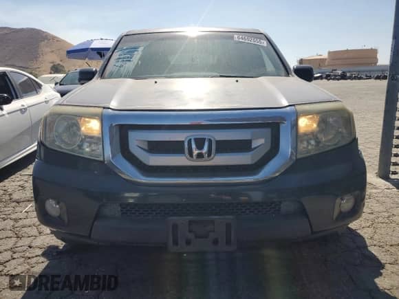 2009 Honda Pilot Touring with VIN 5FNYF488X9B041284, listed as a Copart auction lot 64602555 with 273,147 mi miles and Salvage title. Bid and sale history available at DreamBid. Image 5.