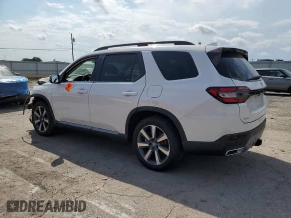 2025 Honda Pilot Touring с VIN 5FNYG1H72SB095316, выставлен на аукционе Copart как лот 67753655 с пробегом Не указан миль и Списание • Salvage title. История ставок и продаж доступна на DreamBid. Изображение 2.