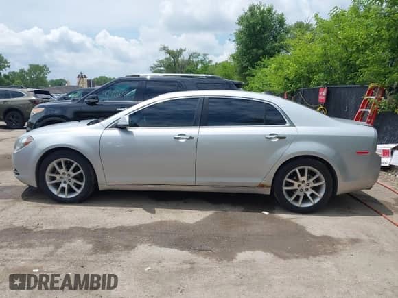2012 Chevrolet Malibu LTZ z VIN 1G1ZG5E79CF270070, wystawiony jako IAAI lot #42496964 z przebiegiem 206 551 mil mil oraz . Historia ofert i sprzedaży dostępna na DreamBid. Obrazek 14.