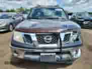 2010 Nissan Frontier Pro-4X with VIN 1N6AD0EV0AC407293, listed as a Copart auction lot 66124105 with 164,320 mi miles and Salvage title. Bid and sale history available at DreamBid. Image 5.