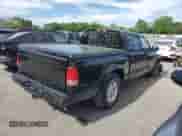 2002 Dodge Dakota Sport z VIN 1B7HL38X02S720595, wystawiony jako Copart lot #57847915 z przebiegiem 200 618 mil mil oraz Szkoda całkowita • Salvage title. Historia ofert i sprzedaży dostępna na DreamBid. Obrazek 3.
