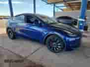 2022 Tesla Model Y Performance with VIN 7SAYGDEFXNF542785, listed as a Copart auction lot 81153785 with 53,108 mi miles and Salvage title. Bid and sale history available at DreamBid. Image 4.