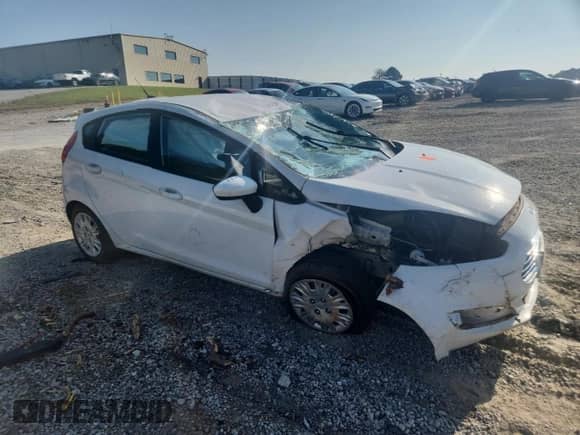 2015 Ford Fiesta S with VIN 3FADP4TJ6FM115013, listed as a Copart auction lot 81570575 with Not provided miles and Salvage title. Bid and sale history available at DreamBid. Image 4.