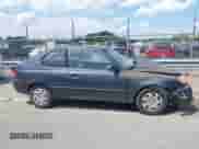 2005 Hyundai Accent GLS z VIN KMHCG35C35U366124, wystawiony jako IAAI lot #42552097 z przebiegiem 205 776 mil mil oraz . Historia ofert i sprzedaży dostępna na DreamBid. Obrazek 12.