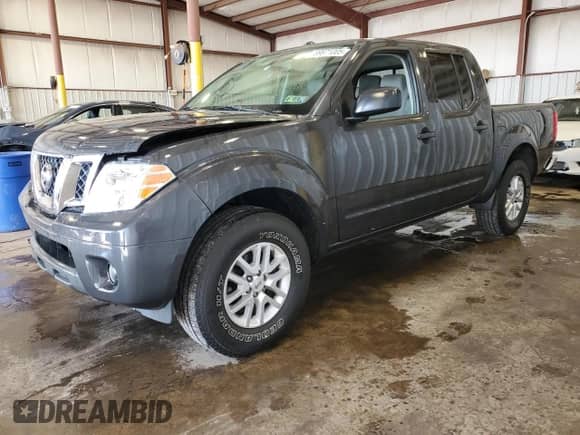 2014 Nissan Frontier S with VIN 1N6AD0EV7EN710291, listed as a Copart auction lot 89871005 with 47,149 mi miles and Salvage title. Bid and sale history available at DreamBid. Image 1.