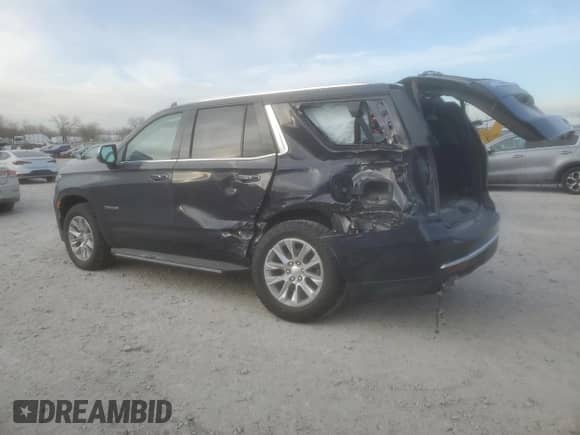 2023 Chevrolet Tahoe Premier with VIN 1GNSCSKD4PR563710, listed as a Copart auction lot 84965394 with 17,528 mi miles and Salvage title. Bid and sale history available at DreamBid. Image 2.