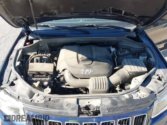 2014 Jeep Grand Cherokee Laredo z VIN 1C4RJFAG7EC126462, wystawiony jako IAAI lot #43445606 z przebiegiem 130 264 mil mil oraz . Historia ofert i sprzedaży dostępna na DreamBid. Obrazek 10.