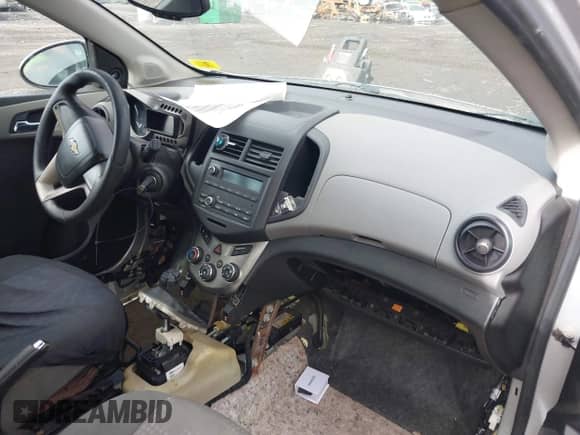 2012 Chevrolet Sonic LS with VIN 1G1JB6SH4C4198334, listed as a IAAI auction lot 42200028 with 207,498 mi miles and . Bid and sale history available at DreamBid. Image 5.