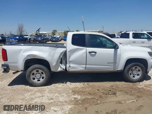 2021 Chevrolet Colorado 2WD Work Truck with VIN 1GCHSBEA2M1184934, listed as a IAAI auction lot 42776763 with 70,594 mi miles and . Bid and sale history available at DreamBid. Image 12.