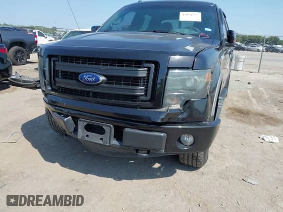 2014 Ford F-150 XLT with VIN 1FTFW1E64EFD14542, listed as a IAAI auction lot 43034880 with 197,620 mi miles and . Bid and sale history available at DreamBid. Image 6.