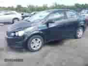 2014 Chevrolet Sonic LT z VIN 1G1JC5SH7E4137635, wystawiony jako IAAI lot #43083539 z przebiegiem 176 334 mil mil oraz . Historia ofert i sprzedaży dostępna na DreamBid. Obrazek 2.