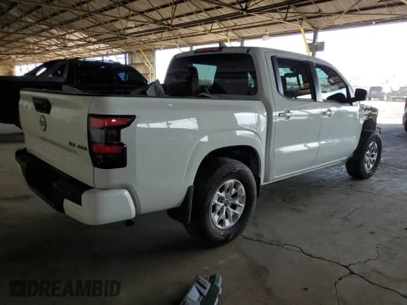 2024 Nissan Frontier Pro-4X with VIN 1N6ED1EK1RN618516, listed as a Copart auction lot 80923405 with 15,257 mi miles and Salvage title. Bid and sale history available at DreamBid. Image 3.