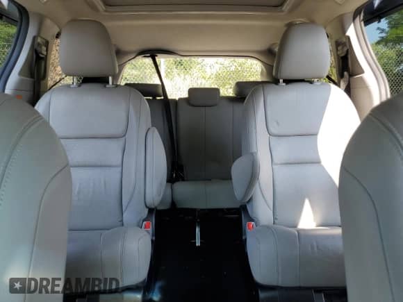 2014 Toyota Sienna Limited z VIN 5TDDK3DC0FS094839, wystawiony jako Copart lot #67808895 z przebiegiem 117 383 mil mil oraz Szkoda całkowita • Salvage title. Historia ofert i sprzedaży dostępna na DreamBid. Obrazek 10.