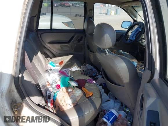 2004 Jeep Grand Cherokee Laredo with VIN 1J4GX48S54C287065, listed as a IAAI auction lot 42780912 with 367,484 mi miles and . Bid and sale history available at DreamBid. Image 8.