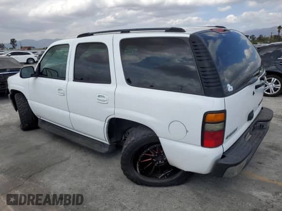 2004 Chevrolet Tahoe LS z VIN 1GNEC13V34R257463, wystawiony jako Copart lot #82425565 z przebiegiem 134 554 mil mil oraz Szkoda całkowita • Salvage title. Historia ofert i sprzedaży dostępna na DreamBid. Obrazek 2.