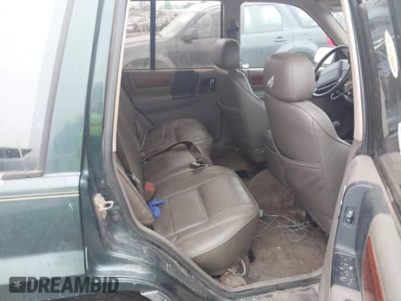 1993 Jeep Grand Cherokee Limited z VIN 1J4GZ78S1PC525798, wystawiony jako IAAI lot #42572328 z przebiegiem 197 551 mil mil oraz . Historia ofert i sprzedaży dostępna na DreamBid. Obrazek 8.