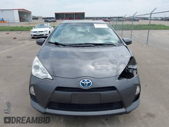 2014 Toyota Prius One with VIN JTDKDTB31E1570290, listed as a IAAI auction lot 42441474 with 164,068 mi miles and . Bid and sale history available at DreamBid. Image 13.