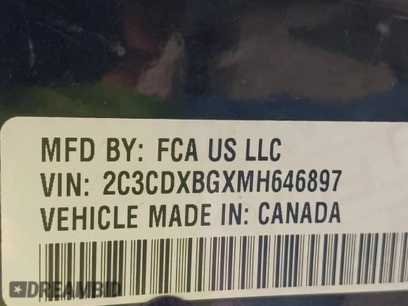 2021 Dodge Charger SXT with VIN 2C3CDXBGXMH646897, listed as a IAAI auction lot 42389796 with 98,510 mi miles and . Bid and sale history available at DreamBid. Image 9.