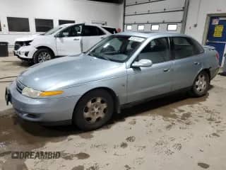 2001 Saturn LS with VIN 1G8JW54R11Y585435, listed as a Copart auction lot 82021364 with 153,436 mi miles and Salvage title. Bid and sale history available at DreamBid. Image 1.