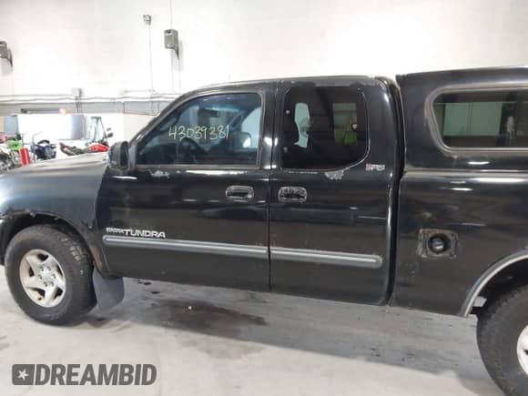 2004 Toyota Tundra SR5 z VIN 5TBBT44124S455471, wystawiony jako IAAI lot #43039381 z przebiegiem 252 480 mil mil oraz . Historia ofert i sprzedaży dostępna na DreamBid. Obrazek 13.