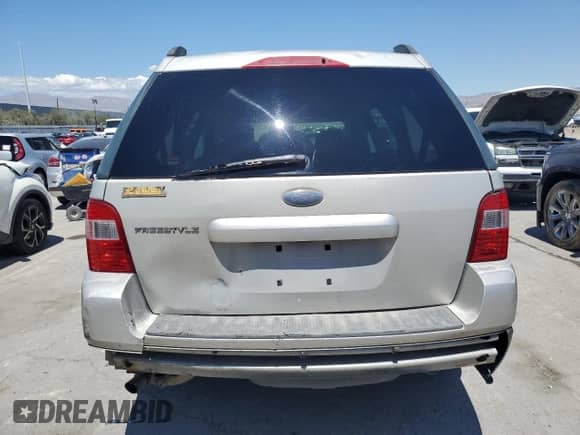 2006 Ford Freestyle SE с VIN 1FMZK01136GA36883, выставлен на аукционе Copart как лот 56223985 с пробегом 156 885 миль миль и Списание • Salvage title. История ставок и продаж доступна на DreamBid. Изображение 6.