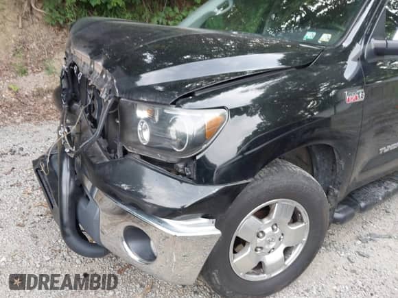 2008 Toyota Tundra with VIN 5TBDV54198S513123, listed as a IAAI auction lot 39662074 with 98,880 mi miles and . Bid and sale history available at DreamBid. Image 20.