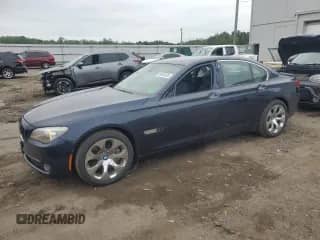 2012 BMW 7 Series 750i xDrive with VIN WBAKC6C52CDX99493, listed as a Copart auction lot 69933035 with 117,809 mi miles and Salvage title. Bid and sale history available at DreamBid. Image 1.
