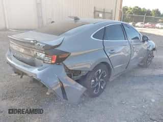 2025 Hyundai Sonata SEL with VIN KMHL64JA0SA452355, listed as a IAAI auction lot 42442856 with 11,906 mi miles and . Bid and sale history available at DreamBid. Image 4.