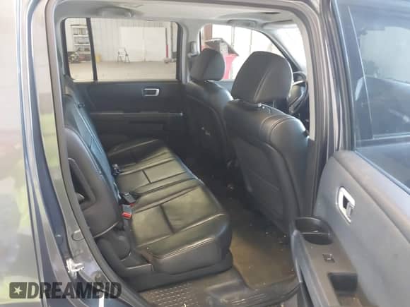 2013 Honda Pilot EX-L with VIN 5FNYF3H51DB027783, listed as a IAAI auction lot 43312919 with 183,629 mi miles and . Bid and sale history available at DreamBid. Image 8.