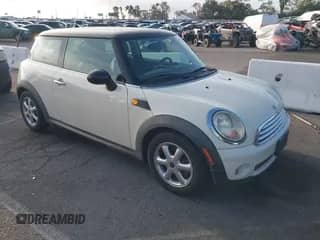 2009 MINI Hardtop with VIN WMWMF33589TW77461, listed as a IAAI auction lot 43271476 with 121,995 mi miles and . Bid and sale history available at DreamBid. Image 1.