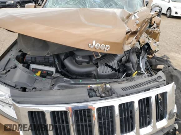 2011 Jeep Grand Cherokee 70th Anniversary with VIN 1J4RR4GG6BC646162, listed as a Copart auction lot 64792705 with Not provided miles and Salvage title. Bid and sale history available at DreamBid. Image 11.