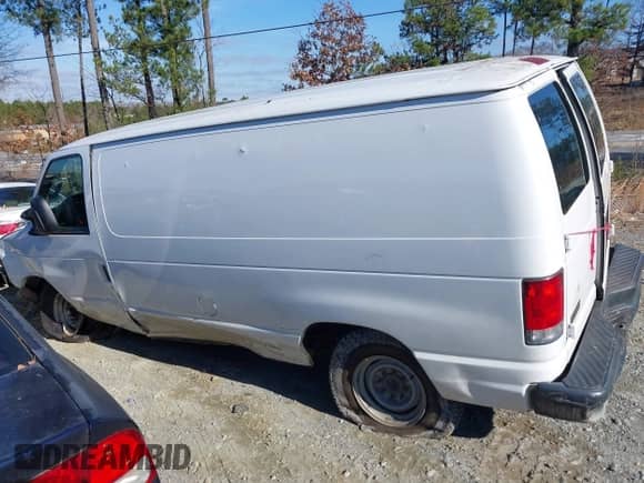 2014 Ford Econoline Cargo Commercial with VIN 1FTSE3ELXEDA59653, listed as a IAAI auction lot 41117376 with 288,008 mi miles and . Bid and sale history available at DreamBid. Image 14.