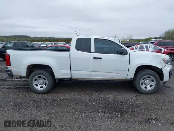 2022 Chevrolet Colorado 2WD Work Truck with VIN 1GCHSBENXN1323079, listed as a IAAI auction lot 41959638 with 19,705 mi miles and . Bid and sale history available at DreamBid. Image 13.