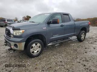 2008 Toyota Tundra with VIN 5TBBV54168S498636, listed as a Copart auction lot 82547435 with 246,673 mi miles and Clean title. Bid and sale history available at DreamBid. Image 1.