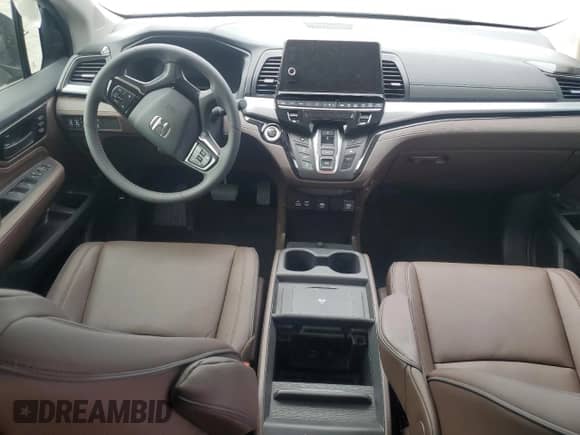 2025 Honda Odyssey Touring z VIN 5FNRL6H88SB054596, wystawiony jako Copart lot #81192585 z przebiegiem Nie podano mil oraz Szkoda całkowita • Salvage title. Historia ofert i sprzedaży dostępna na DreamBid. Obrazek 8.