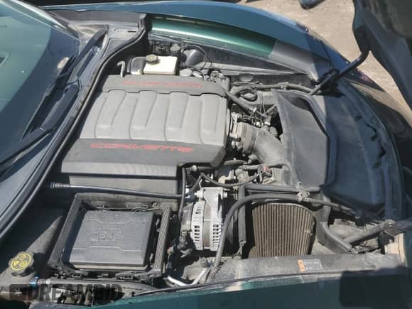 2014 Chevrolet Corvette 1LT z VIN 1G1YB2D71E5112468, wystawiony jako Copart lot #53652534 z przebiegiem 41 088 mil mil oraz Szkoda całkowita • Salvage title. Historia ofert i sprzedaży dostępna na DreamBid. Obrazek 11.