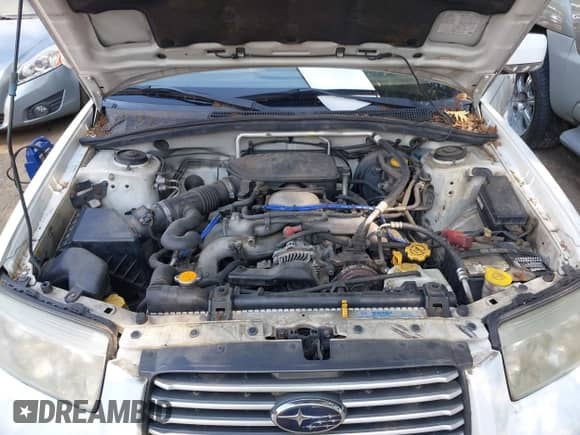 2007 Subaru Forester X z VIN JF1SG65607H703989, wystawiony jako IAAI lot #42787240 z przebiegiem 175 381 mil mil oraz . Historia ofert i sprzedaży dostępna na DreamBid. Obrazek 10.