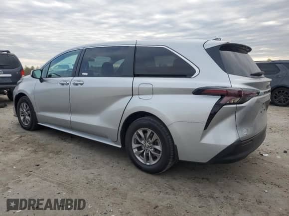 2023 Toyota Sienna LE с VIN 5TDKSKFCXPS079037, выставлен на аукционе Copart как лот 52608555 с пробегом 102 927 миль миль и Списание • Salvage title. История ставок и продаж доступна на DreamBid. Изображение 2.